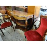 Two velvet covered antique chairs together with a mahogany three-tier console table Condition
