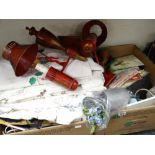 Two boxes of miscellaneous items including table linen, decorative wall lights, kitchen items ETC