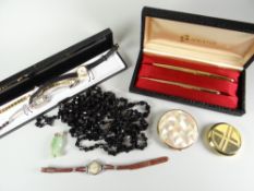 A cased pair of modern quality Sheaffer pens, two compacts, four modern ladies wristwatches, jade