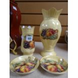 Four items of Aynsley 'Orchard Gold', two vases and two coasters Condition reports provided on