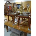 A good vintage oak dining table and four chairs, 150 x 126cms together with a brass effect eight-
