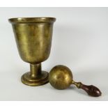 An exotic polished (believed bronze) Tibetan prayer-bell and ball-type clanger with wooden handle,