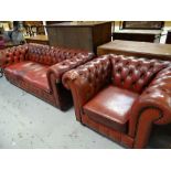 A cherry-red vintage Chesterfield settee and matching armchair (distressed) Condition reports