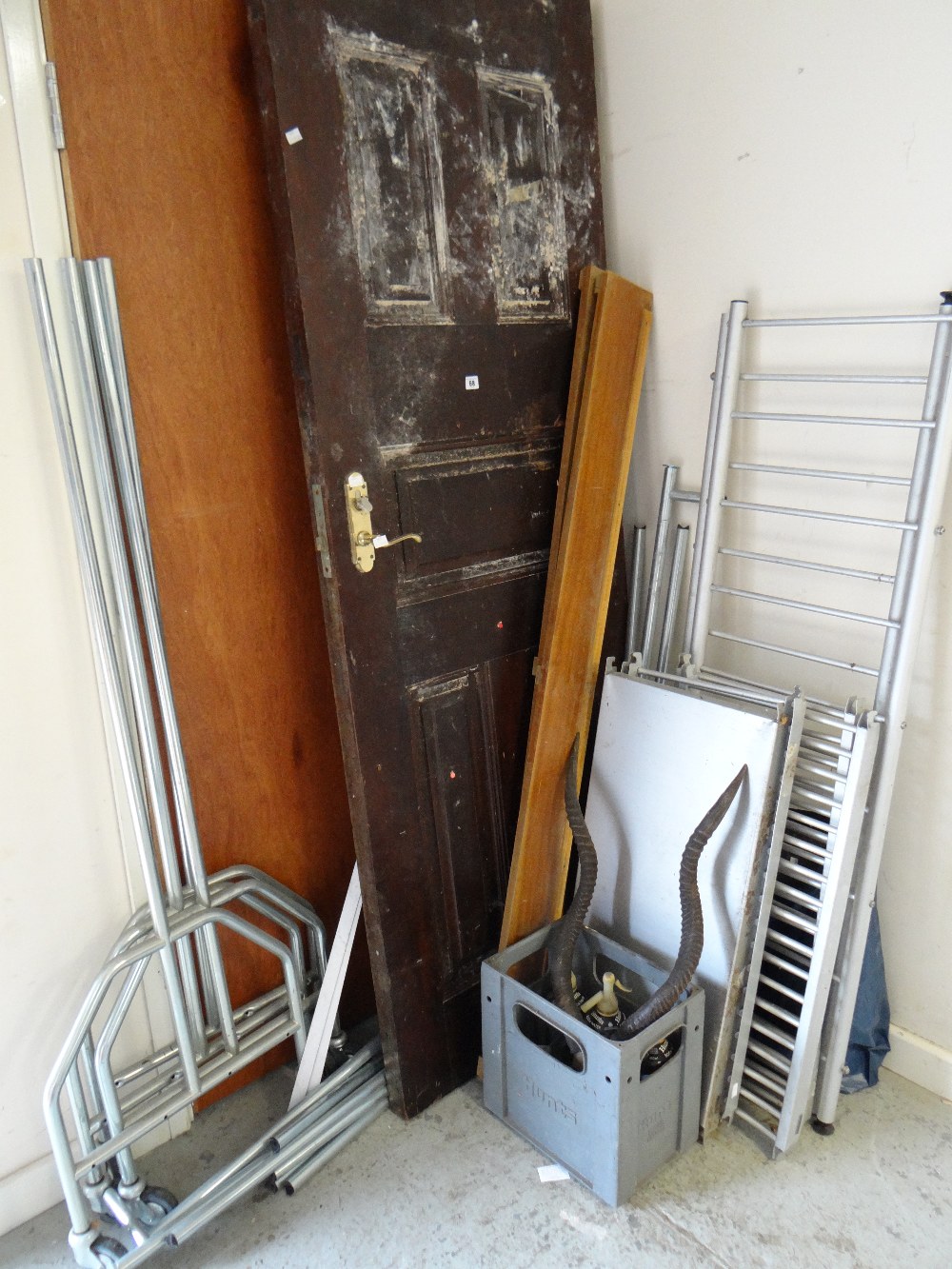 Vintage aluminium shelving, vintage soda syphons, antelope horns, wooden door ETC Condition