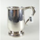 A silver footed mug of plain form with inscriptions, 9.8ozs Condition reports provided on request by