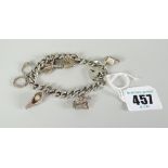 Silver charm bracelet with assorted charms Condition reports provided on request by email for this