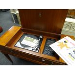 A mid-century Dynatron Garrard gramophone in a reproduction mahogany effect case Condition reports