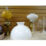 Two modern brass effect oil lamps and shades Condition reports provided on request by email for this