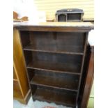 A vintage stained oak four-shelf open bookcase Condition reports provided on request by email for