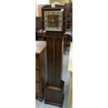A polished grandmother clock with square dial Condition reports provided on request by email for