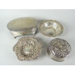 Four silver items comprising two pierced dishes, a circular silver ring-box and a footed oval