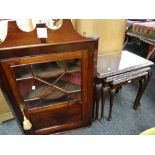 A good quality nineteenth century mahogany hanging corner cabinet with semi-glazed door and broken