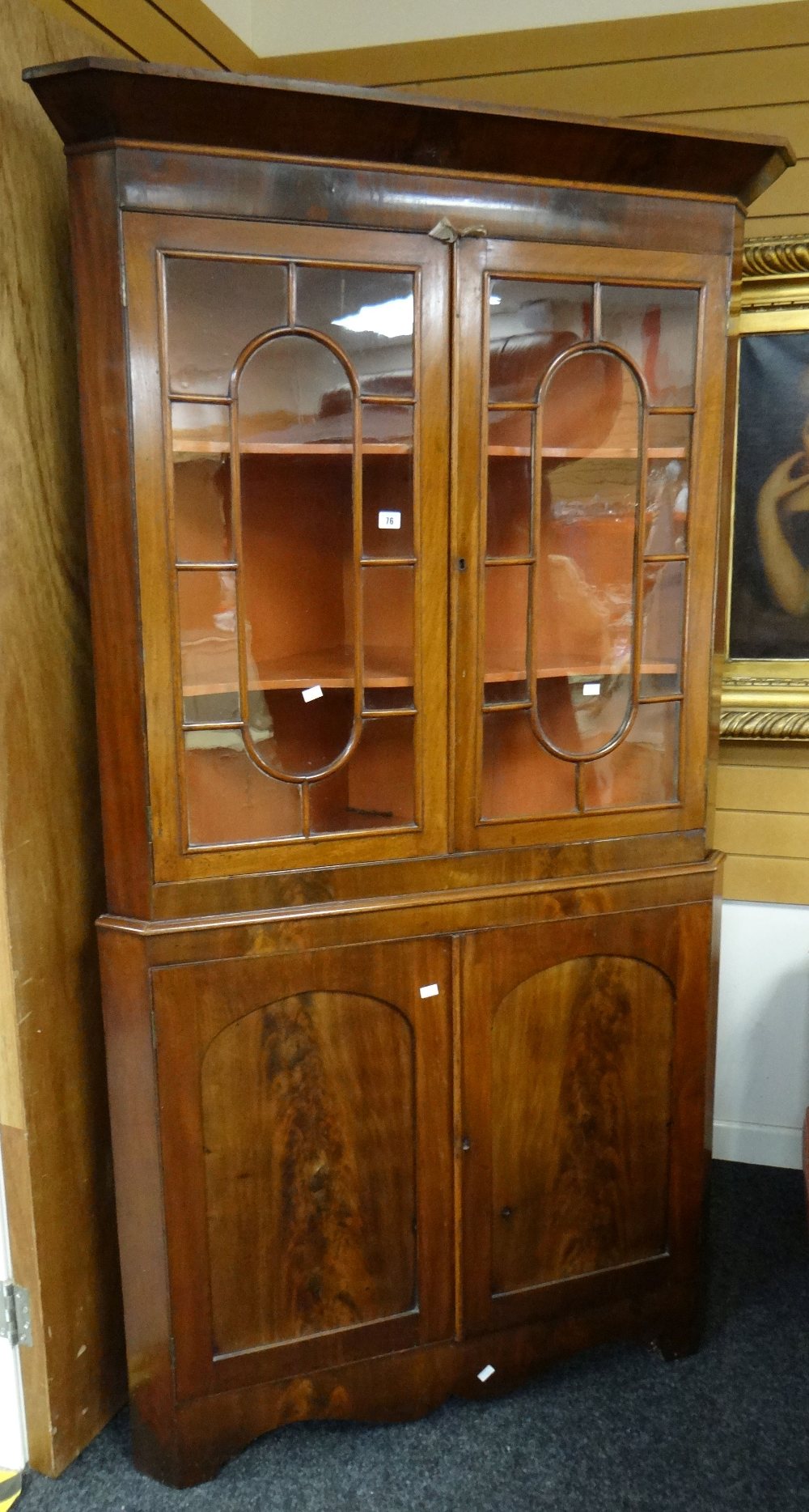 Antique mahogany astragal glazed top standing corner cupboard with two-door cupboard base