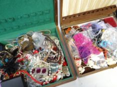 Two dark wood cutlery boxes containing a large parcel of mixed costume jewellery ETC Condition
