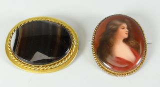 Two yellow metal brooches, one with agate, another with portrait of female (2) Condition reports