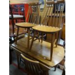 A mid-century drop-leaf table and kitchen table and four chairs Condition reports provided on