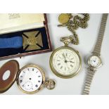 Bag containing two brass encased vintage pocket-watches, a modern wristwatch and a cased Queen