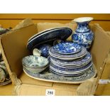 A parcel of interesting blue and white pottery and china including nineteenth century Willow pattern
