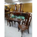 A vintage mahogany extending wind-out dining table with additional leaf and six chairs, 104cms