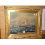 Nineteenth century gilt framed watercolour of a three masted ship at sea, indistinctly signed, 35.