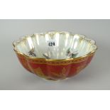 A Wedgwood Fairyland-style lustre bowl of fluted form, the exterior in oxblood-red reserve with