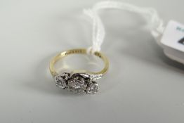 9ct gold & platinum illusion set three-stone twist shank diamond ring, 2 grams Condition reports