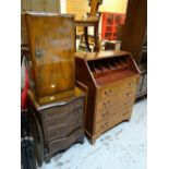 A parcel of furniture including serpentine reproduction chest, bureau, brass benares table ETC