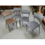 A set of four Ernest Race cast aluminum chairs, model number BA23 with upholstered rails and seats