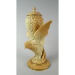A Royal Worcester blush ivory and gilt eagle pot pourri with reticulated bowl and cover, 22cms high,
