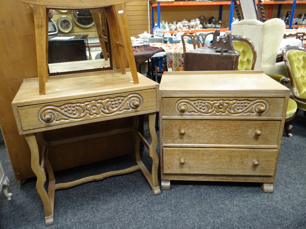 A good mid-century three-piece Heathland lightwood bedroom suite with carved decoration and