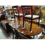A reproduction twin-pedestal dining table and six chairs together with a vintage bureau and a carved