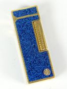 A Dunhill blue mottled enamel and yellow metal gas cigarette lighter Condition reports provided on