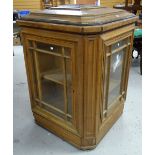 An imposing vintage floor standing mixed wood humidor cabinet, square based and having four glazed