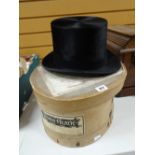 A vintage cased Dunn & Co top-hat Condition reports provided on request by email for this auction