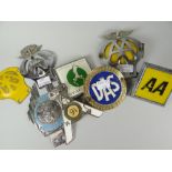 Tin of eight vintage motoring grill badges with brackets Condition reports provided on request by