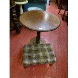 Oak circular topped pedestal table and a tapestry topped footstool