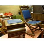 Blue leather upholstered steamer deckchair and a matching vintage wooden commode