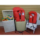 Three items of loom furniture, quantity of life jackets and linen to include a crochet blanket