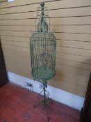 Ornate birdcage on stand