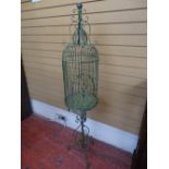 Ornate birdcage on stand