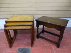 Mid Century nest of three teak tables and a dark wood occasional table