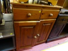Dark wood small compact sideboard of two drawers over two base cupboards