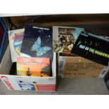 Two boxes of vintage LP records to include Barclay James Harvest, Vangelis, The Shadows, Charlie