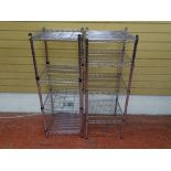 Pair of chrome finished four shelf storage racks