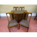 Drop leaf polished dining table and four chairs