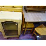 Melamine topped kitchen table, two pine chairs and a small leaded glass kitchen cupboard