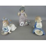 Nao porcelain of a young girl with puppy and two children with breakfast bowls