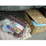 Lidded wicker basket, vintage quilted bed cover, modern patchwork example and one other
