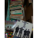 Box of vintage 45rpm records to include The Beatles 'Magical Mystery Tour', 1967 double sleeve and