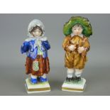 Pair of Rudolstadt Volkstedt German porcelain figurines of a young boy and girl (some chips)